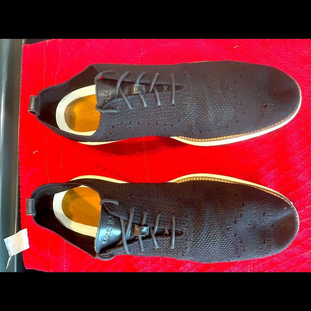 Kenneth Cole! Black with white accents, these are great for any occasion